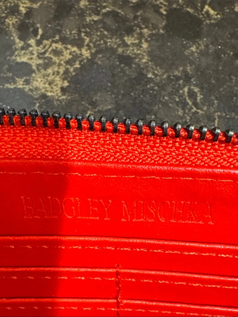 Badgley Mischka Red Zip Wallet with Embossed Logo zipper pull replaced